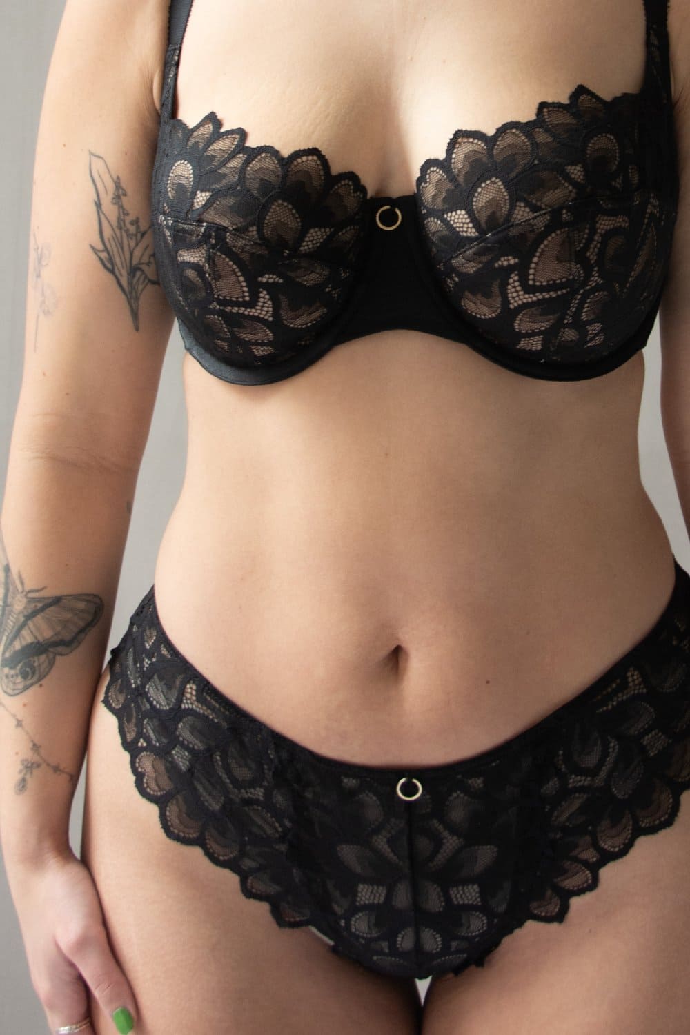 Panache allure brazilian in black, front view on a model, close-up.