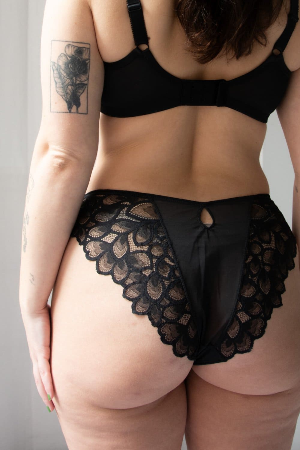Panache allure brazilian in black, back view on a model, close-up.