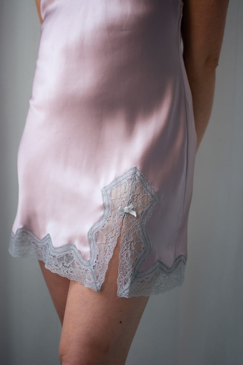 Samantha chang classic silk babydoll in dusk and silver lace, front view on a model, close-up.
