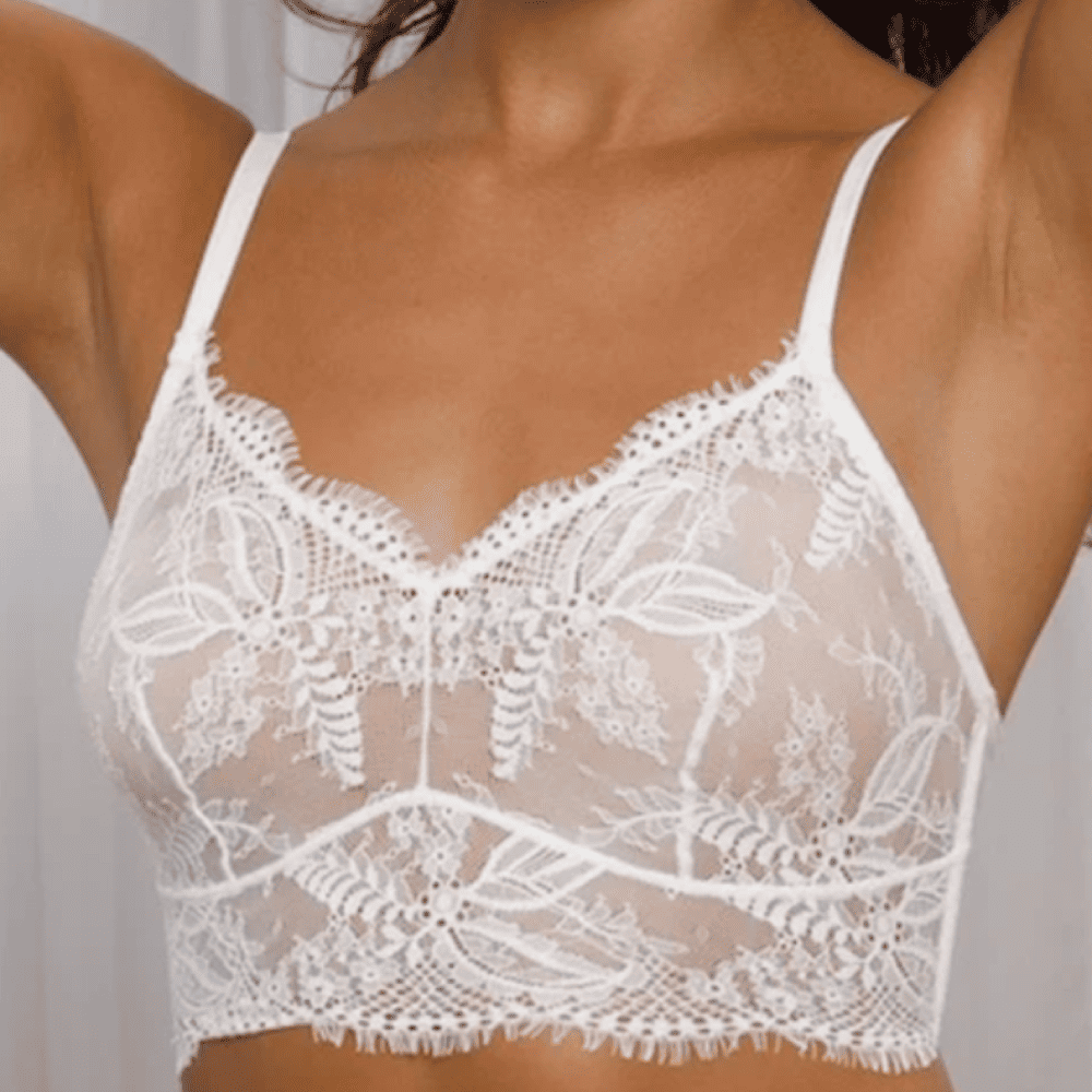Samantha chang illusion longline wireless bra in ecru, front view on a model, close-up.