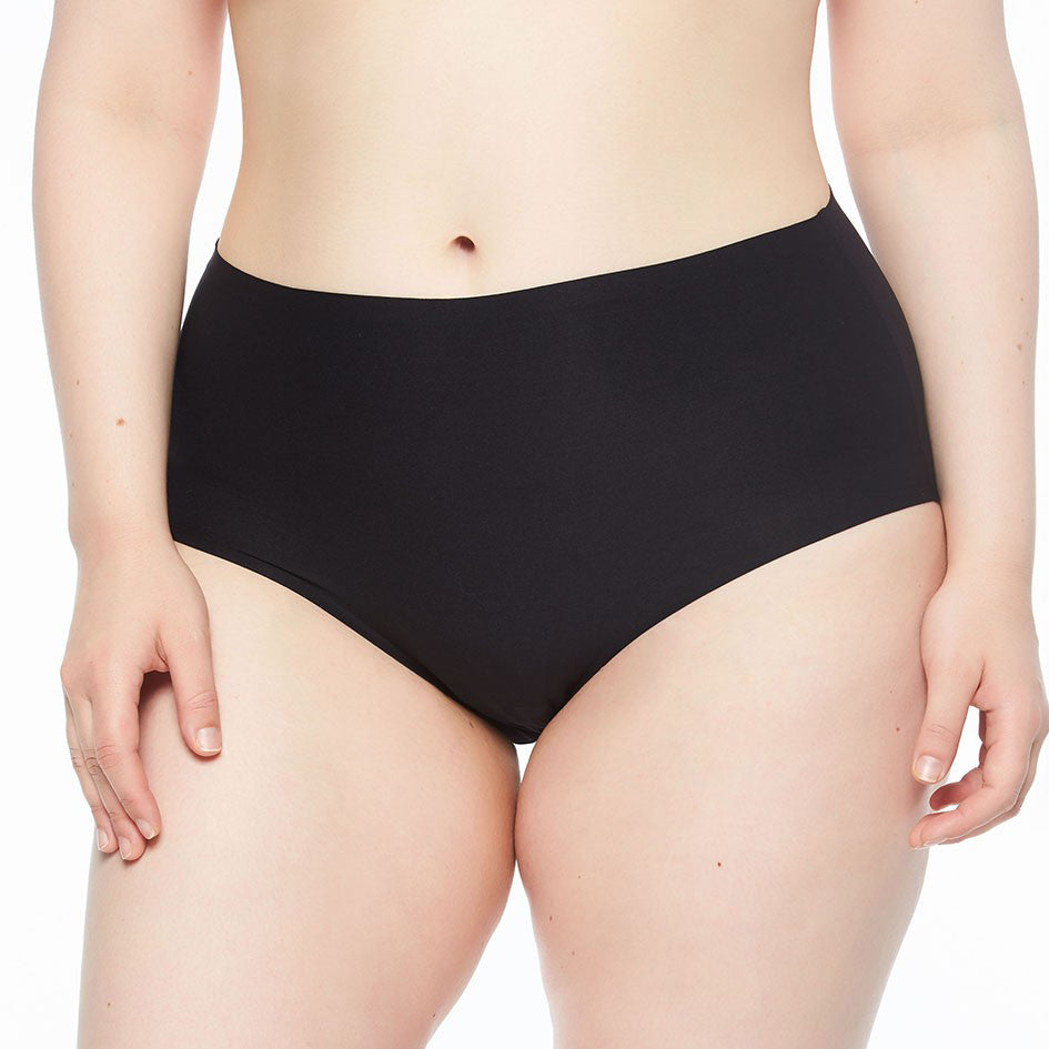 person wearing black seamless underwear against a white background