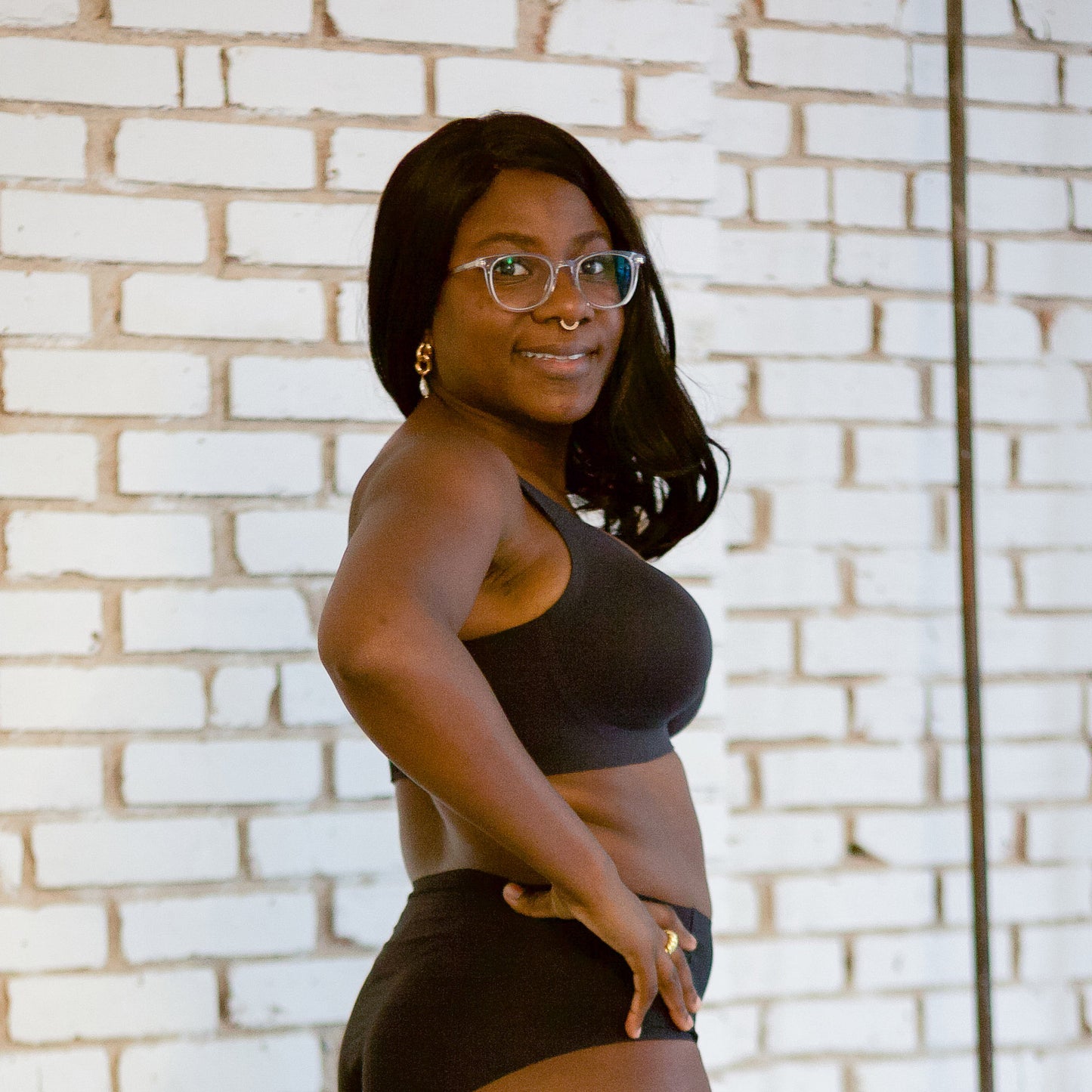 woman wearing black bra